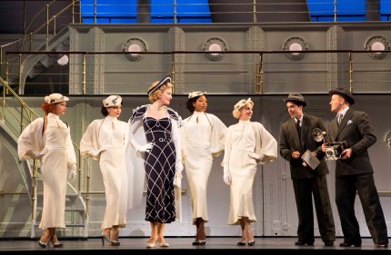 Rachael York as Reno Sweeney and her "Angels" offer photographers a 'wing' and a thigh'