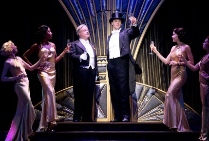 "They think he's 'Gangster Number One' so they've made him their favorite son and that goes to show'--'"Anything Goes"!" Erich Bergen as Billy Crocker with Fred Applegate as "Moonface Martin" (with "Angels"-- 'Charity', "Purity', 'Chastity' and 'Virtue') 