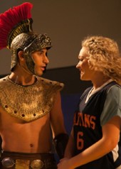Lysistrata (Devon Hadsell) finds and unexpected ally in Xander, the team mascot (Robert Wallace) 