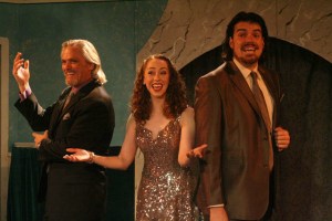 "Life is swinging, bells are ringing, everyday I wake up singing!" Kurt Andrew Hansen is "The Producer" (Man 1) Rachel Hirshee is "The Starlet" (Woman 2) Chris Kerrigan is "The Composer/Actor" (Man 2)