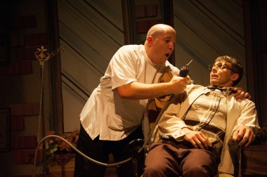 “Oh, the gas isn’t for you, Seymour—it’s for me. I want to really enjoy this and I find that a little giggle-gas before we begin increases MY pleasure enormously.” Chris Harper as Dentist “Orin Scrivello” makes a fatal decision as Scott Leslie as “Seymour” awaits his fate