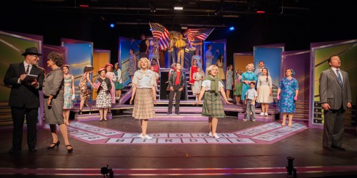 “Now listen here! This gossip must stop! He goes to church each Sunday and he doesn't touch a drop! He's as decent as a minister! He's as sober as a judge!” Chris Peduzzi ( R ) as “Albert” and Adriana Sanchez (L) as “Rose” try to convince the press that Zackary Martinez as “Conrad” ( C ) is a “Healthy Norman American Boy” with the company of One More Production’s “Bye Bye Birdie”