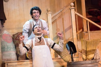 “Out there! There’s a world outside of Yonkers, Barnaby! Way out there beyond this hick-town Barnaby—there’s a slick town Barnaby!” Gary Patent as “Cornelius Hackl” and Chris Villain as “Barnaby Tucker” prepare for the adventure of their lives in 3-D Theatricals “Hello Dolly!” 