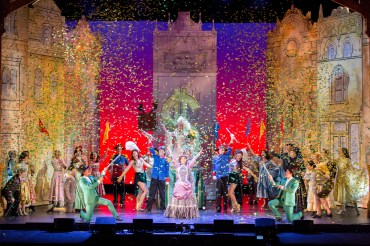 “Look at that crowd up ahead! Listen and hear that brass harmony growing; look at that crowd up ahead! Pardon me if my old spirit is showing…” The cast of 3-D Theatricals’ 2016 Production of “Hello Dolly” are ready to raise the roof and carry on “Before The Parade Passes By”