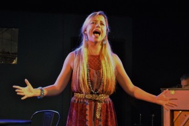 “I'm not afraid of anything--be it mountains, water, dragons, dark or sky; I'm not afraid of anything! Tell me: where's the challenge if you never try?” Bailey Humiston as “Woman 1” celebrates her dauntlessness in The Chromolume Theatre’s “Songs For A New World”