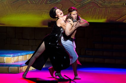 “She was beautiful—but Evil! Saw a lot of men against his will…” Lauren Decierdo as “Mrs. Potiphar” tries putting the moves on ‘slave’ Justin Anthony Long as “Joseph” in 3-D Theatrical’s “Joseph & The Amazing Technicolor Dreamcoat”