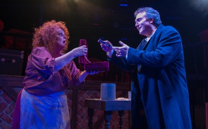 “Them handles is chased silver ain’t they?” Beth Hansen as “Mrs. Lovett ‘re-acquaints’ David Stoneman as “Sweeney Todd” with some ‘old friends’ in “One More Productions’ “Sweeney Todd, The Demon Barber Of Fleet Street”