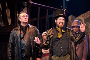 “Gather around Signorini, Signori, you looka a man who have had-a da glory to shave-a da Pope--Mr. Sweeney so smart!” David Stoneman as “Sweeney Todd” challenges Alex Bodrero as street-barber “Adolfo Pirelli” to a test of skill in “One More Productions’ “Sweeney Todd, The Demon Barber Of Fleet Street”