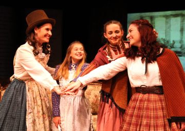 “Our success is guaranteed! Our Christmas will be thrilling—our Christmas will be ‘gory’—our Christmas will exceed our finest dreams!” Ashley Arlene Nelson as “Jo” tries to bolster her siblings’ courage as they prepare for her “Operatic Tragedy” in The Chance Theater’s “Little Women—The Broadway Musical” 