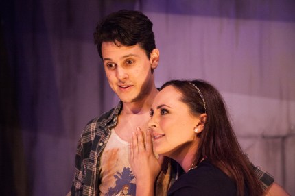 “That bright, shining world is just waiting to start, no meanness or sorrow--just ‘cleanness’ tomorrow, if only you follow your heart.” Ashley Kane as “Hope Cladwell” inspires Daniel Bellusci as “Bobby Strong” to greater action in “The Coeurage Theatre Company’s” production of “Urinetown: The Musical”